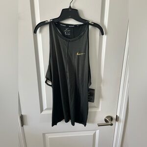 Nike Women's Black and Gold Tank Top